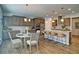 A kitchen with stylish cabinets, counter tops, stainless steel appliances, and bar stool seating at 39 Clubhouse Way, Acworth, GA 30101