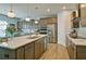 Spacious kitchen featuring custom cabinets, granite countertops, and modern appliances at 39 Clubhouse Way, Acworth, GA 30101