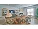 Cozy living room with a fireplace, a ceiling fan, wood-look floors and lots of natural light at 39 Clubhouse Way, Acworth, GA 30101