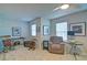 Loft space featuring plush carpeting, fan, many windows, and seating at 39 Clubhouse Way, Acworth, GA 30101
