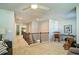 Bright second-story loft area with plush carpeting, lots of light, and seating at 39 Clubhouse Way, Acworth, GA 30101