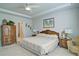 Spacious bedroom with a tray ceiling, comfortable furnishings, and neutral decor at 39 Clubhouse Way, Acworth, GA 30101