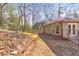 Private backyard featuring mature trees and landscaping at 1446 Lively Ridge Ne Rd, Atlanta, GA 30329