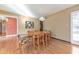 Dining room featuring hardwood floors and a table that seats six at 1446 Lively Ridge Ne Rd, Atlanta, GA 30329