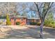 Charming single-story brick home with manicured front yard at 1446 Lively Ridge Ne Rd, Atlanta, GA 30329