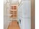 Laundry room with shelving and a stackable washer and dryer at 1446 Lively Ridge Ne Rd, Atlanta, GA 30329