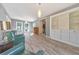 Bright and airy living room featuring neutral paint, recessed lights, hardwood floors and built-in cabinets at 1446 Lively Ridge Ne Rd, Atlanta, GA 30329