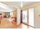 Bright interior view showcasing hardwood floors and access to the outdoor deck at 1446 Lively Ridge Ne Rd, Atlanta, GA 30329