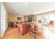 Bright living room with fireplace, hardwood floors, and large windows at 1446 Lively Ridge Ne Rd, Atlanta, GA 30329