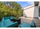Enjoy outdoor living on this roomy deck with comfortable seating, a fire pit, and backyard views at 3633 Broughton Se Cir, Atlanta, GA 30339