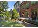 Lush backyard with a stone patio and steps down to the grass at 3633 Broughton Se Cir, Atlanta, GA 30339
