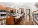 Beautiful kitchen with stainless steel appliances, custom cabinets, large center island and pendant lighting at 3633 Broughton Se Cir, Atlanta, GA 30339