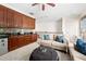 A cozy living room features a wet bar, comfortable seating, carpet flooring, and recessed lighting at 3633 Broughton Se Cir, Atlanta, GA 30339