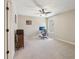 Bedroom featuring a ceiling fan, modern desk setup, and lots of natural light at 4375 Maverick Nw Ln, Kennesaw, GA 30152