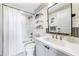 Well-lit bathroom features a tub, shower, modern vanity, and stylish decorative accents at 661 Auburn Ne Ave # 10, Atlanta, GA 30312