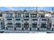 Modern condo building with stylish exterior, private balconies, and nearby city views at 661 Auburn Ne Ave # 10, Atlanta, GA 30312