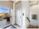 Hallway leading to stairs and a view to the deck with patio furniture and great light at 661 Auburn Ne Ave # 10, Atlanta, GA 30312