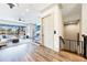 Open-concept living area with an elevator and a staircase nearby a large balcony at 661 Auburn Ne Ave # 10, Atlanta, GA 30312