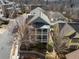 An aerial view highlighting the home's setting within a residential community and neighborhood street at 1637 Duncan Nw Dr, Atlanta, GA 30318