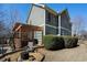 Green backyard with a grill and wooden pergola-covered dining area and fire pit at 1637 Duncan Nw Dr, Atlanta, GA 30318