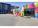 Modern commercial building with colorful mural next to a modern apartment complex at 1637 Duncan Nw Dr, Atlanta, GA 30318