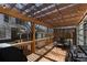 Wooden deck with pergola-covered dining area and a grill at 1637 Duncan Nw Dr, Atlanta, GA 30318