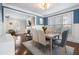 Open concept dining room offering a view into the living area and abundant natural light at 1637 Duncan Nw Dr, Atlanta, GA 30318