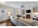 Elegant living room with a fireplace, hardwood floors, and natural light, creating a warm and inviting space at 1637 Duncan Nw Dr, Atlanta, GA 30318