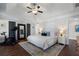 Bright main bedroom features a tray ceiling, peloton, and stylish decor at 1637 Duncan Nw Dr, Atlanta, GA 30318