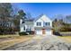 Charming two-story home with a two-car garage and well-maintained front yard at 2971 Ruby Ct, Powder Springs, GA 30127