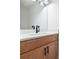 Bathroom featuring wood vanity cabinet, white quartz countertop, and modern fixtures at 3182 Glynn Mill Dr, Snellville, GA 30039