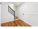 Bright foyer with hardwood floors, staircase, and a paneled door allowing natural light at 3182 Glynn Mill Dr, Snellville, GA 30039