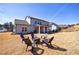 Spacious backyard with patio, fire pit, and seating area, perfect for outdoor entertaining at 17 Baral Rdg, Sharpsburg, GA 30277