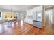 Modern open concept kitchen with stainless steel appliances, quartz counters and breakfast area at 17 Baral Rdg, Sharpsburg, GA 30277