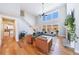 Spacious living room with high ceilings, fireplace, and large windows offering ample natural light at 17 Baral Rdg, Sharpsburg, GA 30277