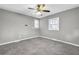 Bedroom with neutral carpet, window, and ceiling fan at 2006 Conrad Se Ave, Atlanta, GA 30315