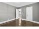Neutral bedroom features hardwood floors and natural light at 2006 Conrad Se Ave, Atlanta, GA 30315