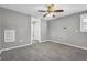 Bedroom with neutral carpet, window, and ceiling fan at 2006 Conrad Se Ave, Atlanta, GA 30315