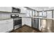 Modern kitchen boasts stainless steel appliances, granite countertops, and sleek cabinetry at 2006 Conrad Se Ave, Atlanta, GA 30315