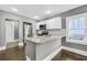 Updated kitchen featuring granite countertops, stainless steel appliances, and a breakfast bar at 2006 Conrad Se Ave, Atlanta, GA 30315