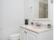 Bright bathroom featuring a vanity with a stone countertop and walk-in shower at 1073 Oakland Drive Sw Dr, Atlanta, GA 30310