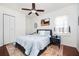 Bright bedroom with ceiling fan, area rug, and modern decor. Has a window for natural light at 1073 Oakland Drive Sw Dr, Atlanta, GA 30310