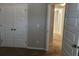 View of bedroom featuring a large closet, neutral paint, and carpet at 11978 Lovejoy Crossing Way, Hampton, GA 30228