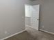 Bedroom featuring neutral walls and carpet floors at 11978 Lovejoy Crossing Way, Hampton, GA 30228