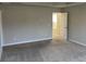 Bedroom with carpet flooring, neutral walls, and natural light at 11978 Lovejoy Crossing Way, Hampton, GA 30228