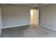 Neutral toned main bedroom with carpeted floors and a closet at 11978 Lovejoy Crossing Way, Hampton, GA 30228