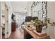 Elegant hallway featuring a decorative mirror and a view of the Primary bedroom at 1418 Dresden Ne Dr # 355, Atlanta, GA 30319