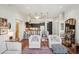 Living room with hardwood floors and opening into the kitchen, complete with bar stool seating at the island at 1418 Dresden Ne Dr # 355, Atlanta, GA 30319