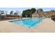 Sparkling community pool with a lifeguard stand, offering a refreshing retreat for residents at 172 Sweet Branch Ct, Grayson, GA 30017