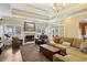 Cozy living room featuring a fireplace, comfortable seating, and french doors, ideal for entertaining guests at 172 Sweet Branch Ct, Grayson, GA 30017